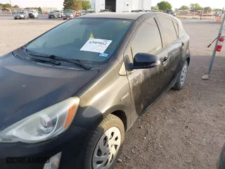 2016 Toyota Prius c One with VIN JTDKDTB35G1122931, listed as a IAAI auction lot 42009812 with 80,970 mi miles. Bid and sale history available at carsss.com. Image 2.