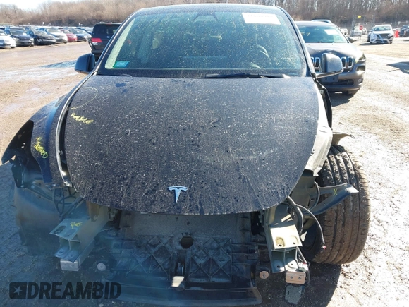 2022 Tesla Model Y Performance with VIN 7SAYGDEFXNF313636, listed as a IAAI auction lot 41660019 with 30,258 mi miles and . Bid and sale history available at DreamBid. Image 10.