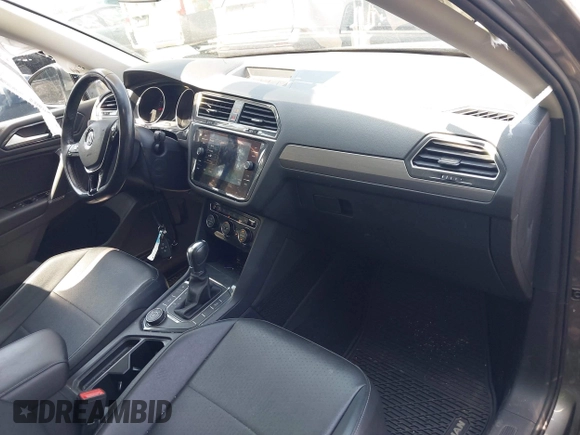 2018 Volkswagen Tiguan SEL with VIN 3VV2B7AXXJM020392, listed as a IAAI auction lot 42646948 with 58,685 mi miles and . Bid and sale history available at DreamBid. Image 5.