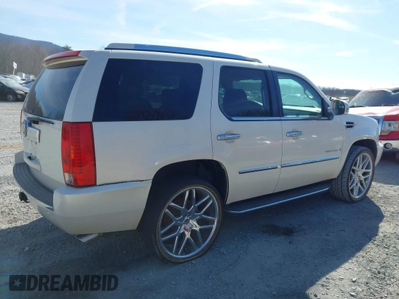 2009 Cadillac Escalade z VIN 1GYFK53219R121847, wystawiony jako IAAI lot #41818934 z przebiegiem 132 293 mil mil oraz . Historia ofert i sprzedaży dostępna na DreamBid. Obrazek 6.