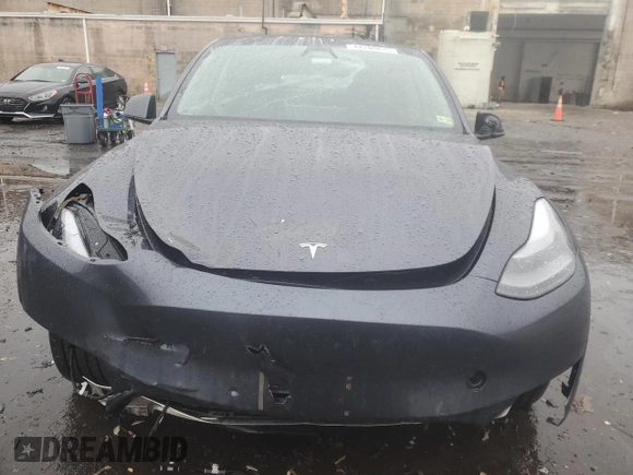 2023 Tesla Model Y Long Range with VIN 7SAYGDEE8PF895293, listed as a Copart auction lot 44208615 with 16,549 mi miles and Salvage Title. Bid and sale history available at DreamBid. Image 5.
