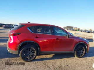 2022 Mazda CX-5 2.5 Turbo with VIN JM3KFBAY4N0564000, listed as a IAAI auction lot 41076013 with 25,106 mi miles and . Bid and sale history available at carsss.com. Image 13.