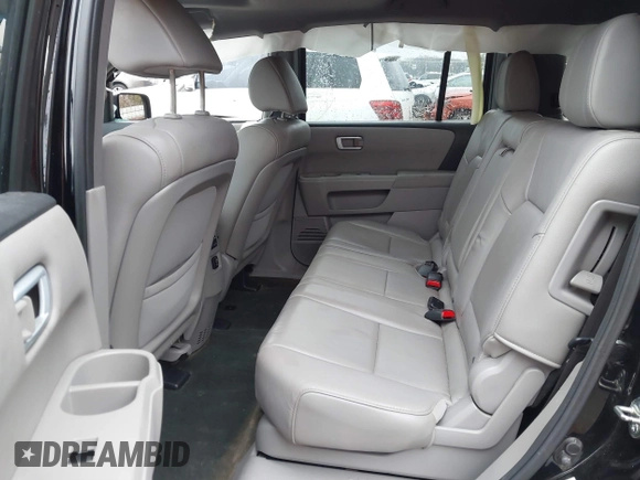 2014 Honda Pilot EX-L with VIN 5FNYF3H50EB024598, listed as a IAAI auction lot 40864689 with 159,078 mi miles and . Bid and sale history available at DreamBid. Image 8.