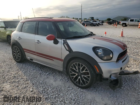 2016 MINI Countryman John Cooper Works with VIN WMWXD1C59GWT97602, listed as a Copart auction lot 52898605 with 141,749 mi miles and Salvage Title. Bid and sale history available at DreamBid. Image 4.