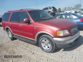 1999 Ford Expedition XLT z VIN 1FMRU1761XLA11489, wystawiony jako IAAI lot #42099591 z przebiegiem 191 222 mil mil oraz . Historia ofert i sprzedaży dostępna na DreamBid. Obrazek 1.