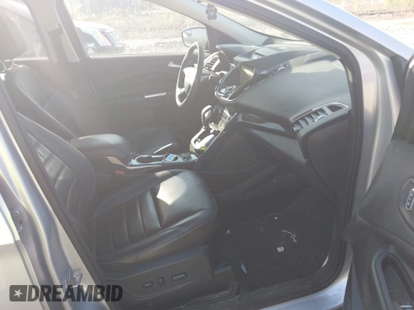 2016 Ford Escape Titanium with VIN 1FMCU9JX2GUA50916, listed as a IAAI auction lot 42118711 with 121,405 mi miles. Bid and sale history available at carsss.com. Image 5.