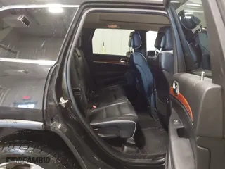 2011 Jeep Grand Cherokee Overland with VIN 1J4RR6GT7BC607735, listed as a IAAI auction lot 41830669 with 98,161 mi miles. Bid and sale history available at carsss.com. Image 8.