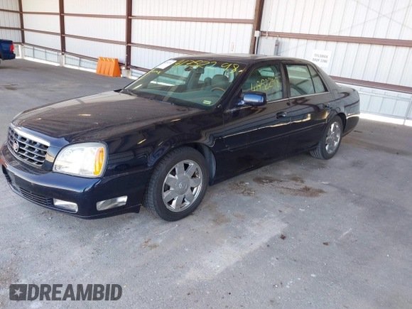 2004 Cadillac DeVille DTS z VIN 1G6KF57934U181654, wystawiony jako IAAI lot #41752298 z przebiegiem 131 861 mil mil oraz . Historia ofert i sprzedaży dostępna na DreamBid. Obrazek 2.