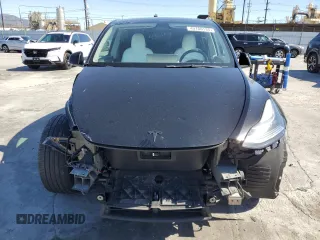 2022 Tesla Model Y Long Range z VIN 7SAYGDEE2NF442073, wystawiony jako Copart lot #49180135 z przebiegiem 34 742 mil mil oraz Szkoda całkowita • Salvage title. Historia ofert i sprzedaży dostępna na DreamBid. Obrazek 5.