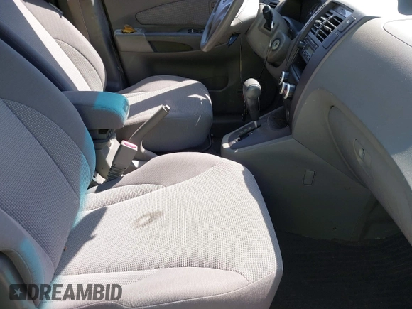 2006 Hyundai Tucson GL with VIN KM8JM12BX6U249982, listed as a IAAI auction lot 41976033 with 107,153 mi miles. Bid and sale history available at carsss.com. Image 5.