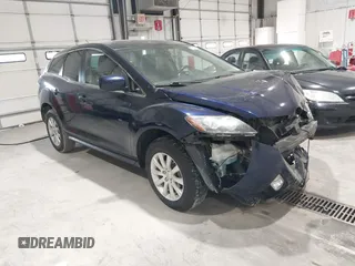 2012 Mazda CX-7 i Touring z VIN JM3ER2C58C0412211, wystawiony jako IAAI lot #41402580 z przebiegiem 122 773 mil mil oraz . Historia ofert i sprzedaży dostępna na DreamBid. Obrazek 1.