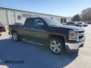 2015 Chevrolet Silverado 1500 LS with VIN 1GCRCPEH4FZ380583, listed as a Copart auction lot 49405885 with 51,436 mi miles and Salvage Title. Bid and sale history available at DreamBid. Image 4.