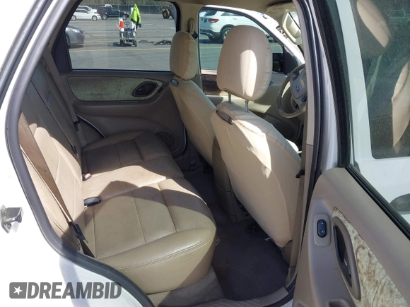 2005 Ford Escape XLT with VIN 1FMYU03165KA93495, listed as a IAAI auction lot 41821975 with 202,475 mi miles and . Bid and sale history available at DreamBid. Image 8.
