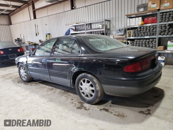 1999 Buick Regal GS with VIN 2G4WF5219X1424704, listed as a Copart auction lot 42899215 with 137,744 mi miles and Salvage Title. Bid and sale history available at carsss.com. Image 2.