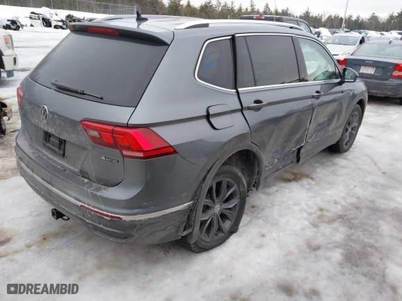 2022 Volkswagen Tiguan SE with VIN 3VV2B7AX8NM019151, listed as a IAAI auction lot 41637857 with 47,869 mi miles. Bid and sale history available at carsss.com. Image 4.