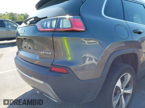 2021 Jeep Cherokee Limited z VIN 1C4PJMDX6MD209395, wystawiony jako IAAI lot #42073746 z przebiegiem 26 627 mil mil oraz . Historia ofert i sprzedaży dostępna na DreamBid. Obrazek 18.