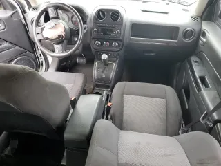 2017 Jeep Patriot Latitude with VIN 1C4NJPFB9HD187411, listed as a Copart auction lot 52579165 with 153,869 mi miles and Salvage Title. Bid and sale history available at DreamBid. Image 8.