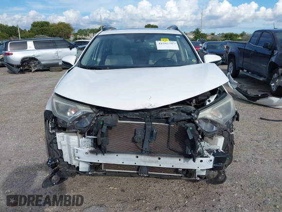 2018 Toyota RAV4 XLE with VIN JTMWFREV7JJ174483, listed as a IAAI auction lot 41597797 with 82,836 mi miles. Bid and sale history available at carsss.com. Image 13.