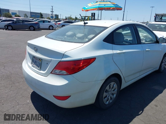2015 Hyundai Accent GLS with VIN KMHCT4AEXFU922052, listed as a IAAI auction lot 41986823 with 106,134 mi miles and . Bid and sale history available at DreamBid. Image 4.