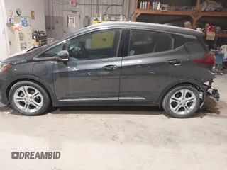2021 Chevrolet Bolt EV LT z VIN 1G1FY6S05M4111315, wystawiony jako IAAI lot #41511422 z przebiegiem 14 433 mil mil oraz . Historia ofert i sprzedaży dostępna na DreamBid. Obrazek 13.