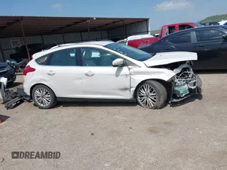 2016 Ford Focus Titanium with VIN 1FADP3N28GL222941, listed as a IAAI auction lot 42050881 with 97,001 mi miles and . Bid and sale history available at DreamBid. Image 13.