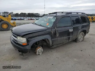 2003 Chevrolet Tahoe Z71 with VIN 1GNEK13T03R124255, listed as a Copart auction lot 42002945 with 205,965 mi miles and Salvage Title. Bid and sale history available at carsss.com. Image 1.