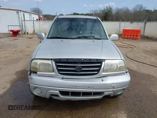 2002 Suzuki XL7 Standard z VIN JS3TY92V824101190, wystawiony jako IAAI lot #41749203 z przebiegiem 239 447 mil mil oraz . Historia ofert i sprzedaży dostępna na DreamBid. Obrazek 12.