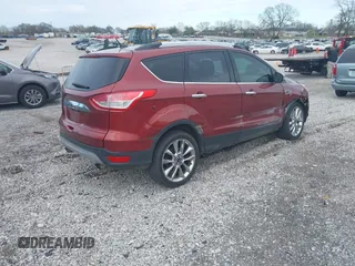 2015 Ford Escape SE with VIN 1FMCU9G95FUA50545, listed as a IAAI auction lot 41866861 with 116,188 mi miles and . Bid and sale history available at DreamBid. Image 4.