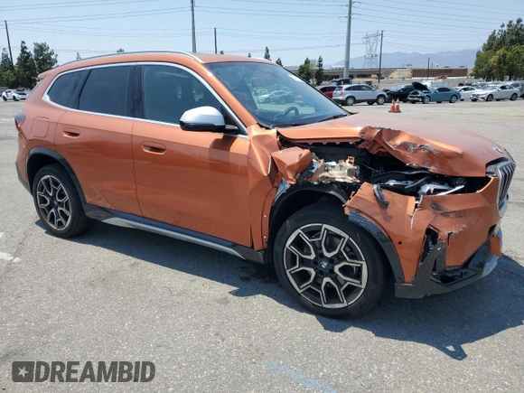 2023 BMW X1 xDrive28i with VIN WBX73EF03P5W54209, listed as a Copart auction lot 64796365 with 19,591 mi miles and Salvage title. Bid and sale history available at DreamBid. Image 4.