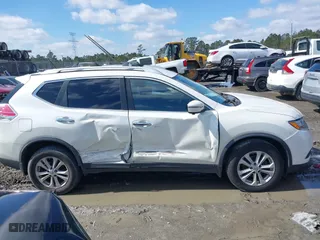 2016 Nissan Rogue S with VIN JN8AT2MV5GW141929, listed as a IAAI auction lot 41585948 with 105,464 mi miles. Bid and sale history available at carsss.com. Image 13.