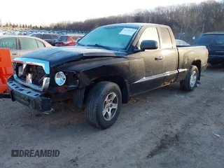 2005 Dodge Dakota SLT with VIN 1D7HW42N95S315558, listed as a IAAI auction lot 41210145 with 207,115 mi miles and . Bid and sale history available at DreamBid. Image 2.