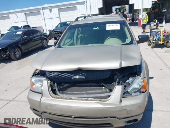 2005 Ford Freestyle SE z VIN 1FMZK01115GA63370, wystawiony jako IAAI lot #41882239 z przebiegiem 139 257 mil mil oraz . Historia ofert i sprzedaży dostępna na DreamBid. Obrazek 12.