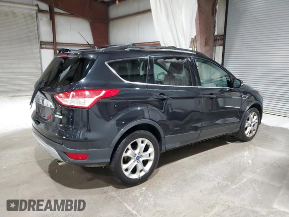 2013 Ford Escape SEL with VIN 1FMCU0H98DUD50796, listed as a Copart auction lot 64014515 with 209,791 mi miles and Salvage title. Bid and sale history available at DreamBid. Image 3.