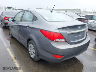 2015 Hyundai Accent GLS with VIN KMHCT4AE0FU927177, listed as a IAAI auction lot 41559026 with 181,703 mi miles. Bid and sale history available at carsss.com. Image 3.