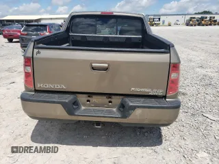 2011 Honda Ridgeline RTL with VIN 5FPYK1F59BB007045, listed as a Copart auction lot 61263715 with 159,527 mi miles and Clean title. Bid and sale history available at DreamBid. Image 6.