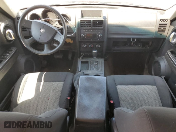 2010 Dodge Nitro Heat with VIN 1D4PT4GKXAW156990, listed as a Copart auction lot 54610695 with 180,620 mi miles and Salvage title. Bid and sale history available at DreamBid. Image 8.