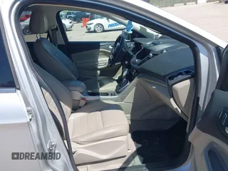 2013 Ford Escape SEL with VIN 1FMCU9H91DUA14749, listed as a IAAI auction lot 42039685 with 186,669 mi miles. Bid and sale history available at carsss.com. Image 5.