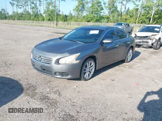2014 Nissan Maxima SV with VIN 1N4AA5AP5EC436199, listed as a IAAI auction lot 42887082 with 151,551 mi miles and . Bid and sale history available at DreamBid. Image 2.