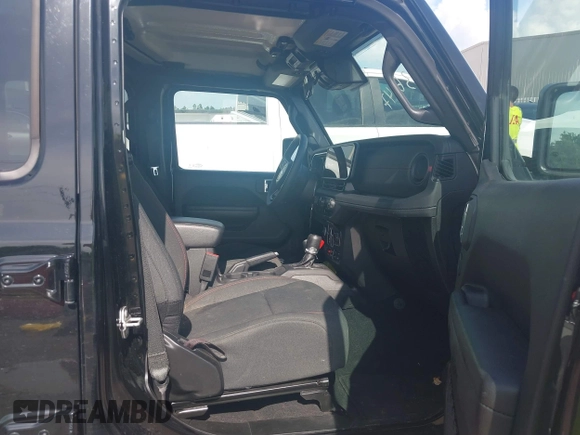 2024 Jeep Wrangler Rubicon with VIN 1C4PJXFG0RW271322, listed as a IAAI auction lot 42736647 with 32,319 mi miles and . Bid and sale history available at DreamBid. Image 5.