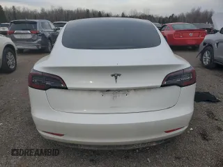 2020 Tesla Model 3 Standard Range Plus z VIN 5YJ3E1EAXLF733894, wystawiony jako Copart lot #49152645 z przebiegiem Nie podano mil oraz Czysty tytuł • Clean title. Historia ofert i sprzedaży dostępna na DreamBid. Obrazek 6.