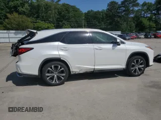 2018 Lexus RX 350L Premium с VIN JTJGZKCA6J2003296, выставлен на аукционе Copart как лот 57141205 с пробегом 78 366 миль миль и Списание • Salvage title. История ставок и продаж доступна на DreamBid. Изображение 3.