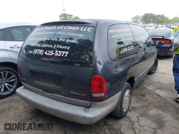 1996 Dodge Caravan Sport with VIN 2B4GP4439TR803645, listed as a IAAI auction lot 42122379 with 185,159 mi miles and . Bid and sale history available at carsss.com. Image 4.