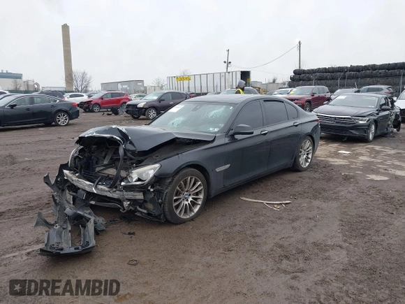 2015 BMW 7 Series 750i xDrive with VIN WBAYB6C59FD965820, listed as a IAAI auction lot 41558215 with 142,617 mi miles. Bid and sale history available at carsss.com. Image 16.