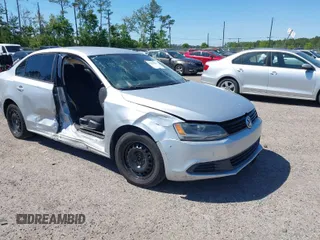 2014 Volkswagen Jetta Sedan S with VIN 3VW2K7AJ6EM220778, listed as a IAAI auction lot 42035805 with 131,524 mi miles. Bid and sale history available at carsss.com. Image 1.