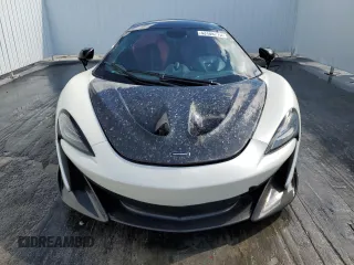 2016 McLaren 570S z VIN SBM13DAA3GW001071, wystawiony jako Copart lot #43108715 z przebiegiem Nie podano mil oraz Szkody całkowita. Historia ofert i sprzedaży dostępna na DreamBid. Obrazek 5.