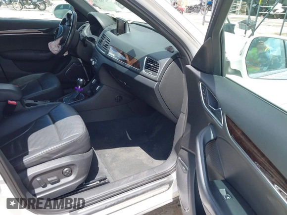 2015 Audi Q3 Prestige with VIN WA1GFCFS1FR007092, listed as a IAAI auction lot 42588730 with 85,290 mi miles and . Bid and sale history available at DreamBid. Image 5.