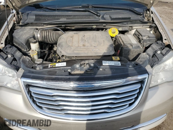 2015 Chrysler Town & Country Touring L with VIN 2C4RC1CG0FR513812, listed as a Copart auction lot 77467854 with 157,196 mi miles and Clean Title. Bid and sale history available at DreamBid. Image 12.