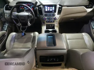 2017 GMC Yukon SLT with VIN 1GKS2BKC1HR223083, listed as a Copart auction lot 45017495 with 61,632 mi miles and Salvage Title. Bid and sale history available at DreamBid. Image 8.