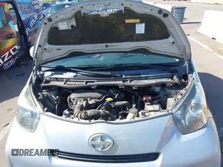 2014 Scion iQ with VIN JTNJJXB02EJ027026, listed as a IAAI auction lot 42619439 with 103,261 mi miles and . Bid and sale history available at DreamBid. Image 10.
