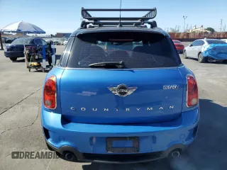 2013 MINI Countryman S with VIN WMWZC3C51DWP23167, listed as a Copart auction lot 63933185 with 72,329 mi miles and Salvage title. Bid and sale history available at DreamBid. Image 6.